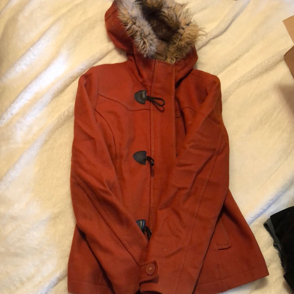 A warm winter coat with fur